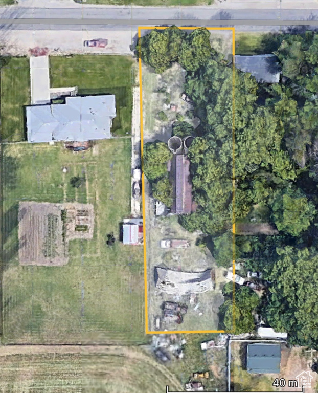 Aerial overview of property\'s location with property parcel outlined