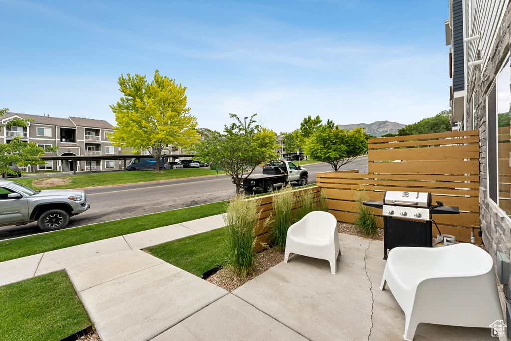 View of patio / terrace featuring area for grilling and a mountain view