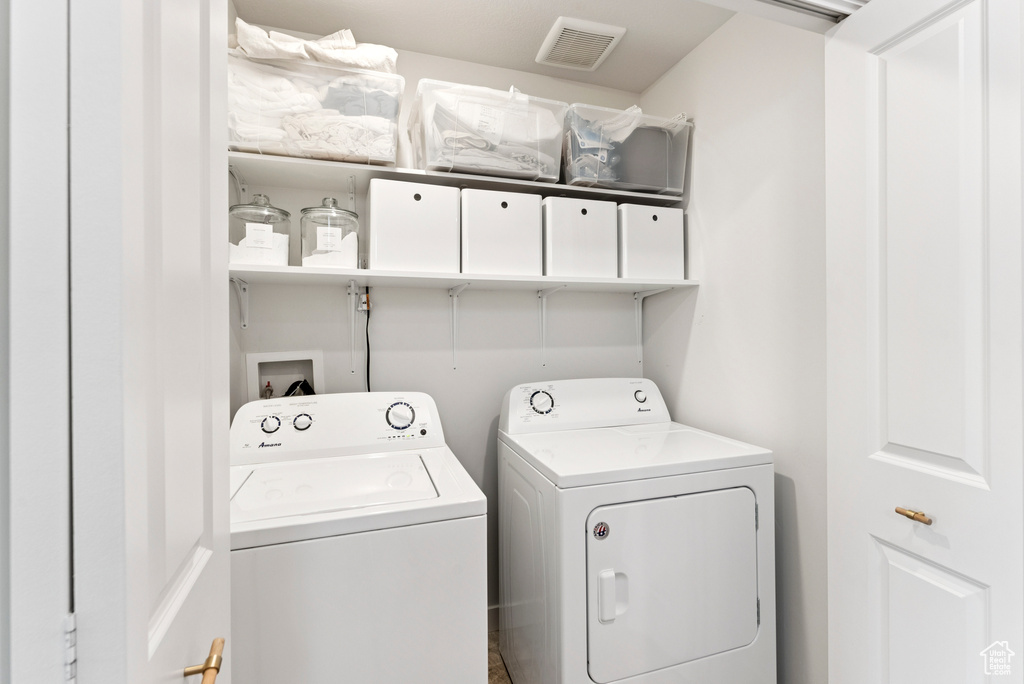 Laundry area with separate washer and dryer