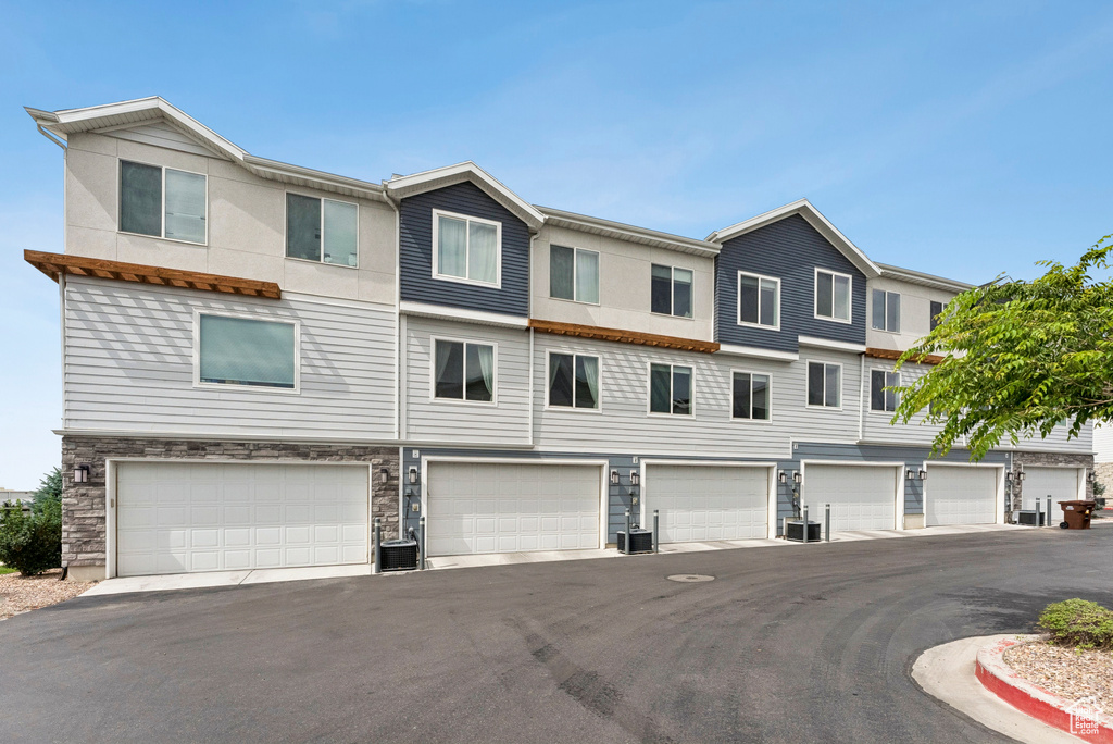 View of property featuring an attached garage