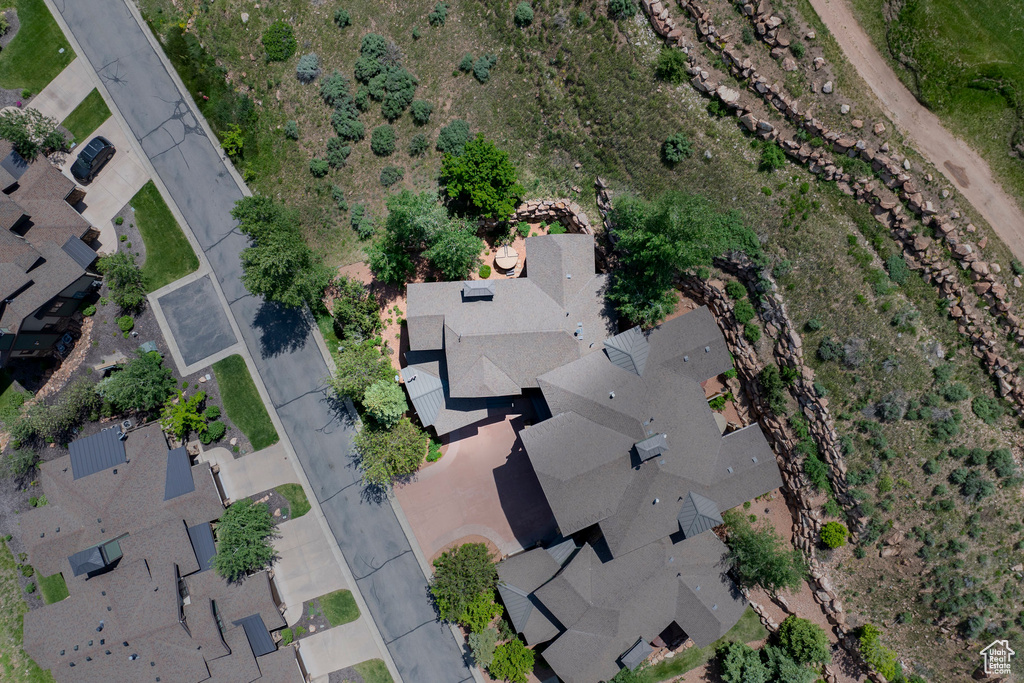 Aerial overview of property's location featuring nearby suburban area