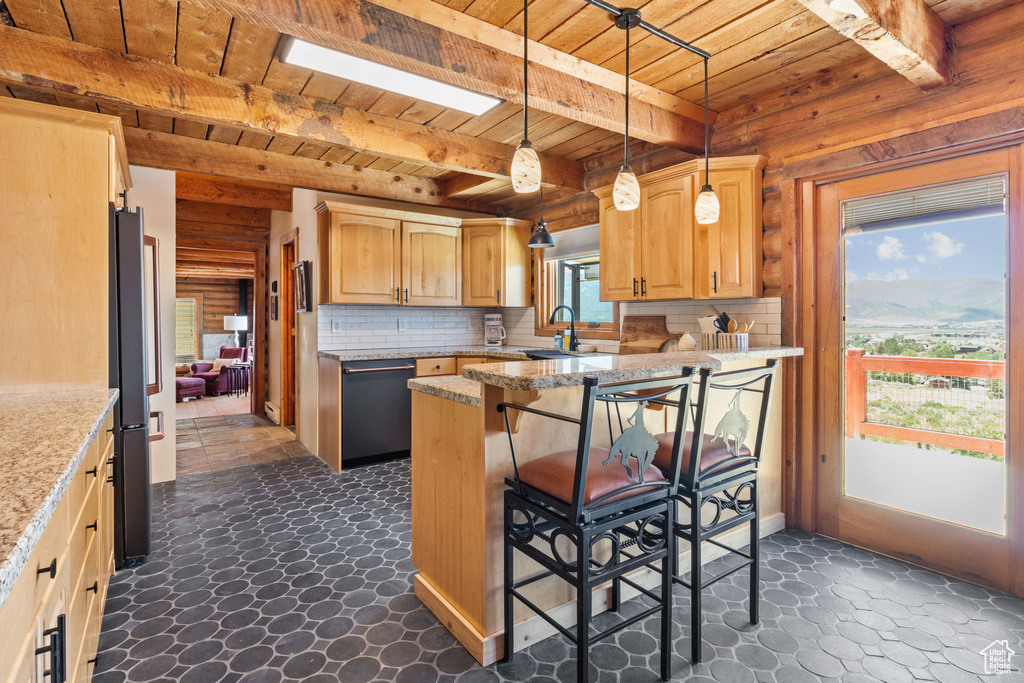 Kitchen with a wood ceiling with exposed beams, black appliances, a kitchen bar, tasteful backsplash, and light stone counters