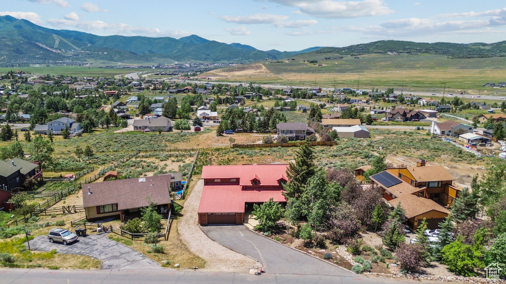 Aerial perspective of suburban area with mountains