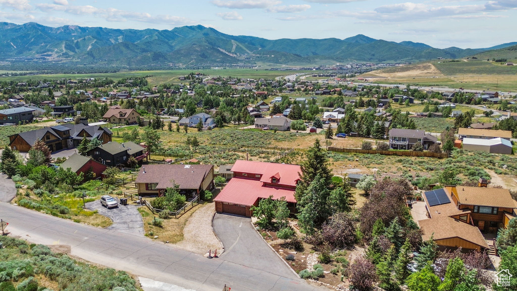 Aerial view of residential area featuring mountains