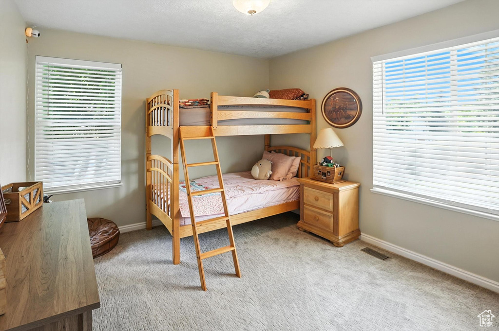 Bedroom with carpet