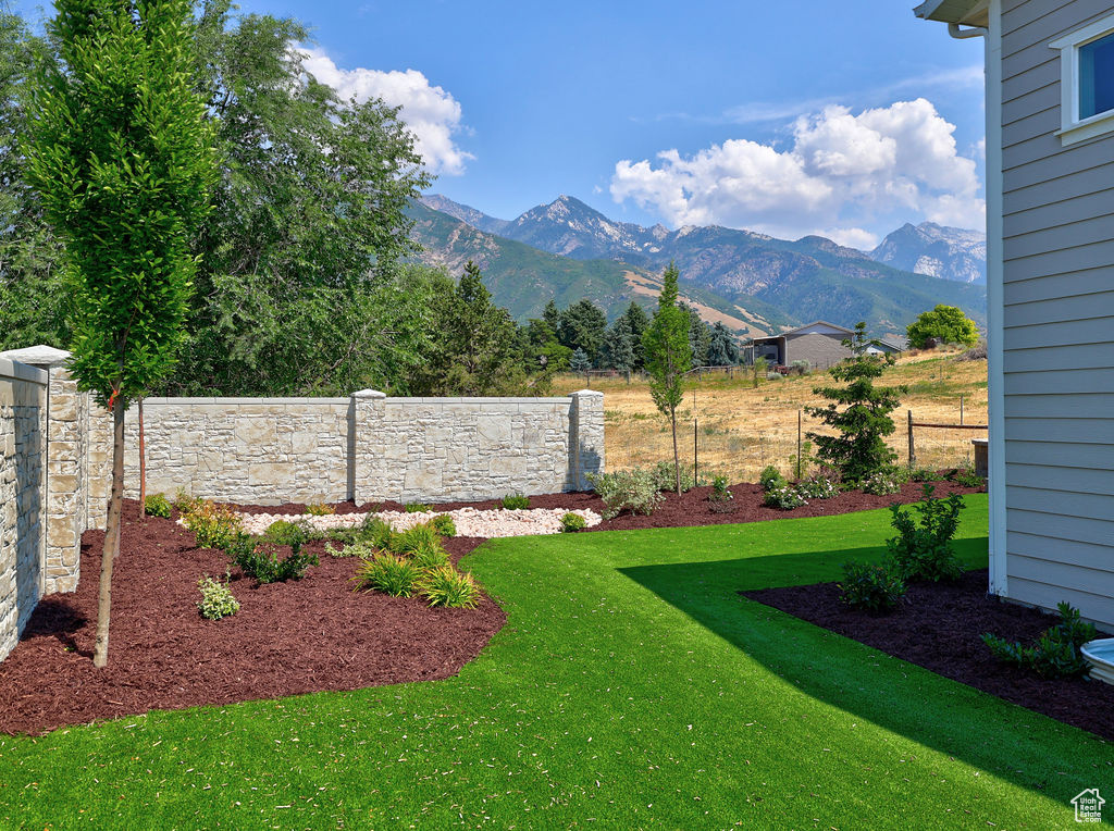 View of yard with a mountain view