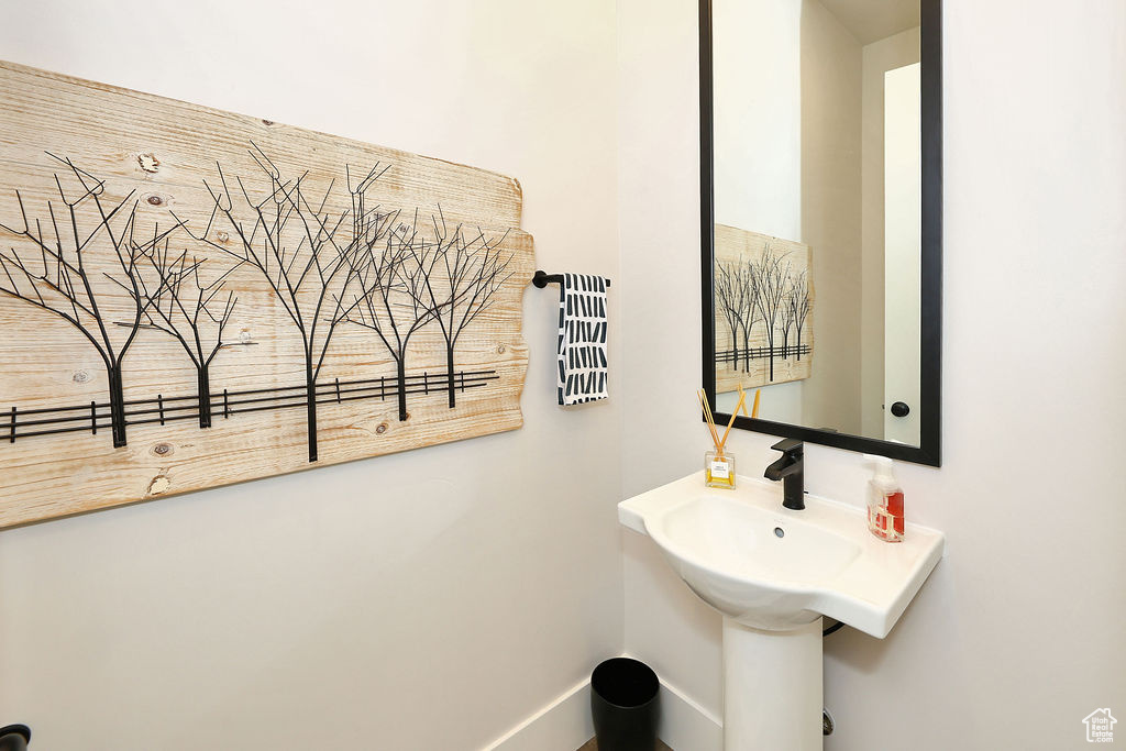 Bathroom featuring baseboards
