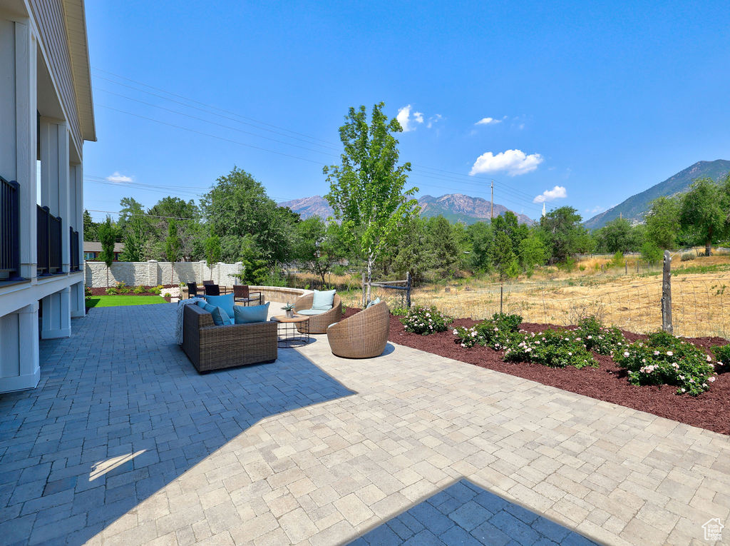 View of patio / terrace featuring a mountain view and outdoor lounge area