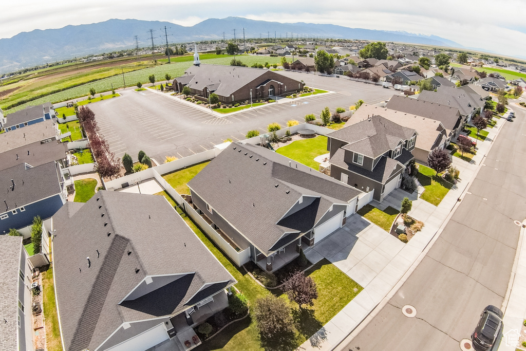 Aerial view of residential area with a mountain backdrop