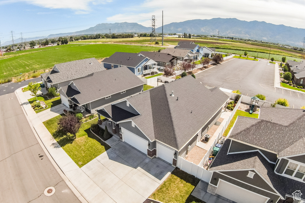 Aerial view of residential area with a mountainous background