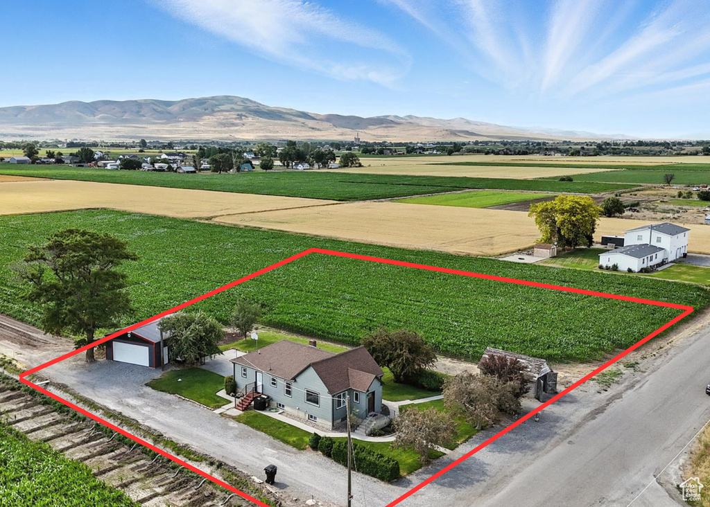 View of rural area with property parcel outlined and a mountainous background