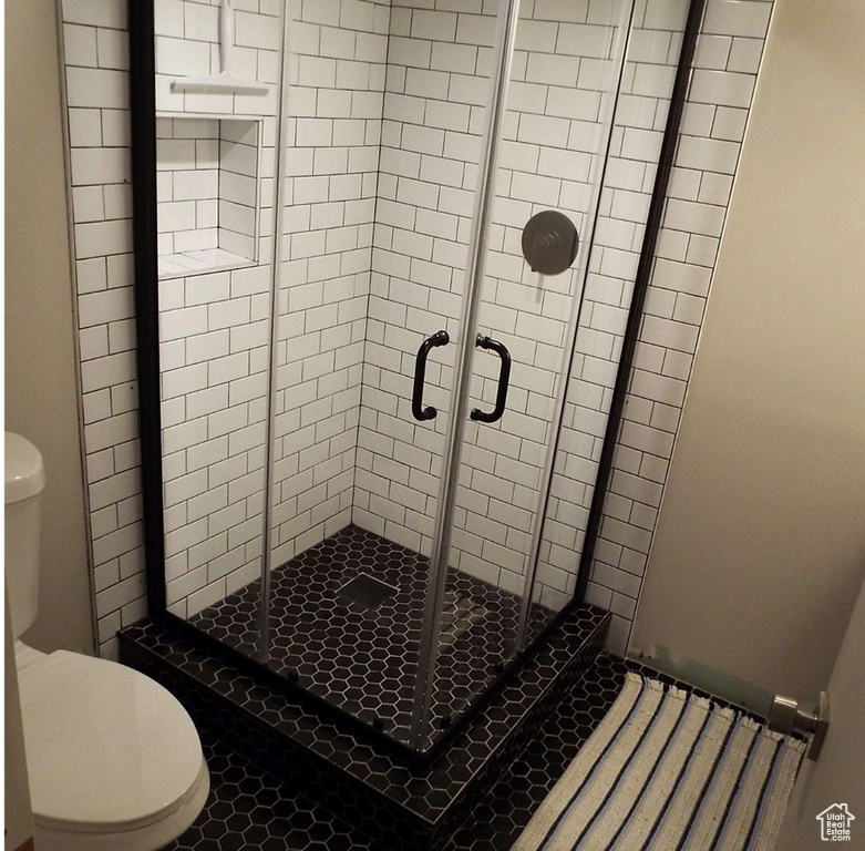 Bathroom featuring a stall shower