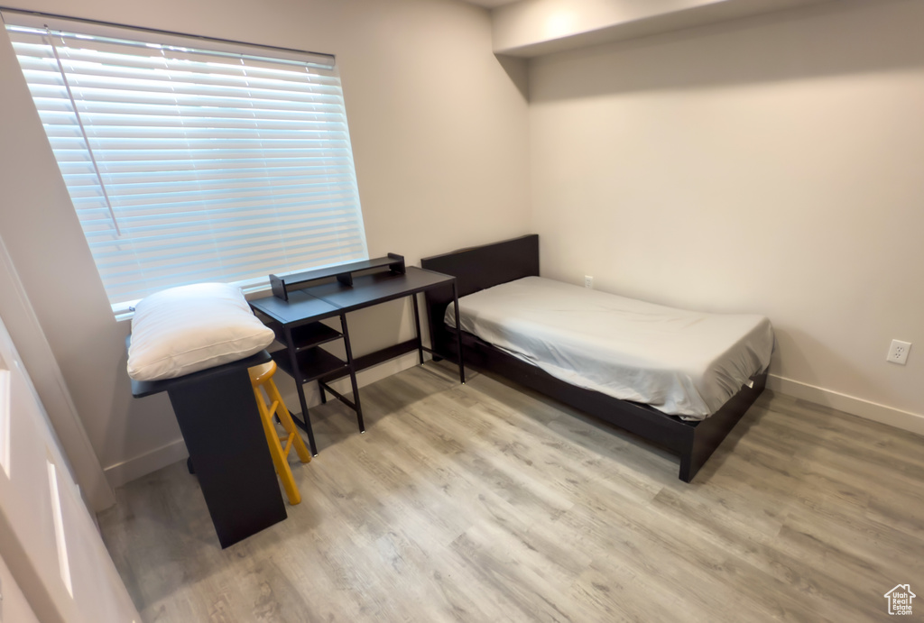 Bedroom featuring light wood-style floors