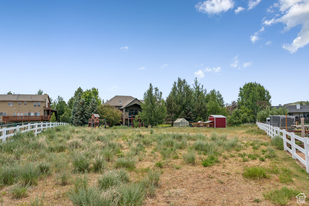 View of yard with a shed