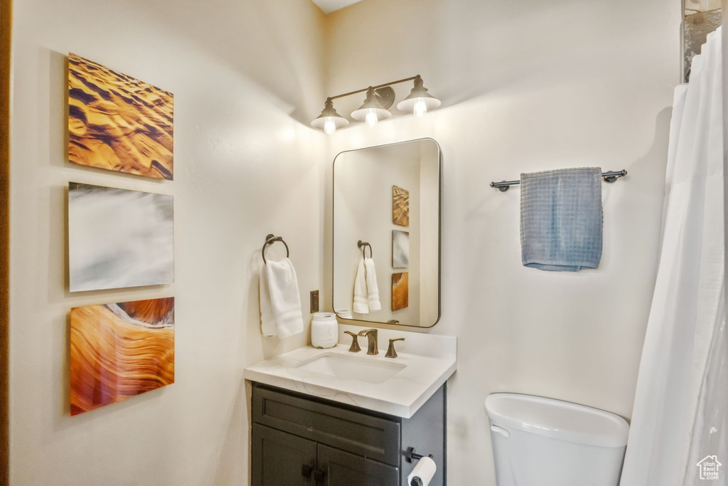 Bathroom with vanity and toilet