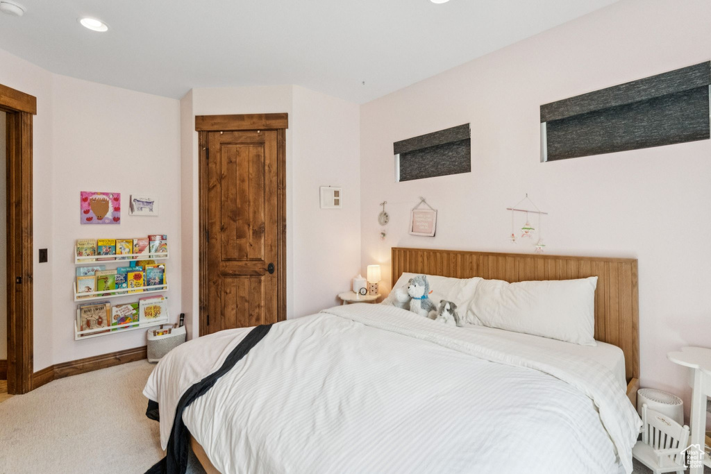 Bedroom featuring carpet flooring and recessed lighting