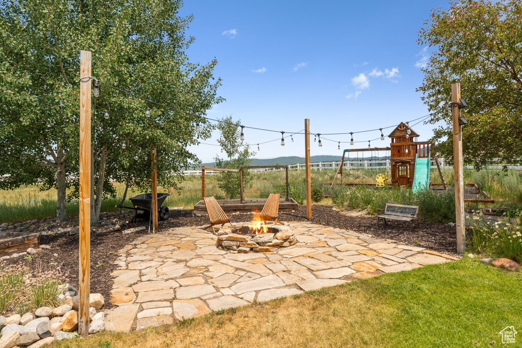 View of patio / terrace featuring a fire pit
