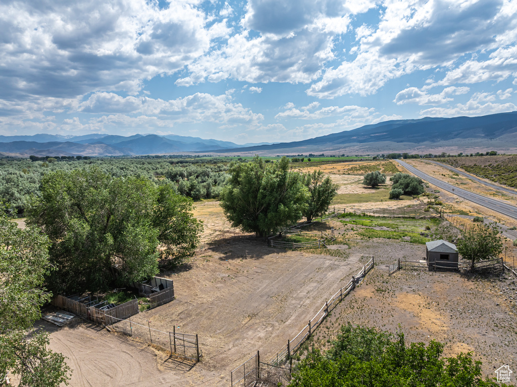 View of mountain background featuring rural landscape