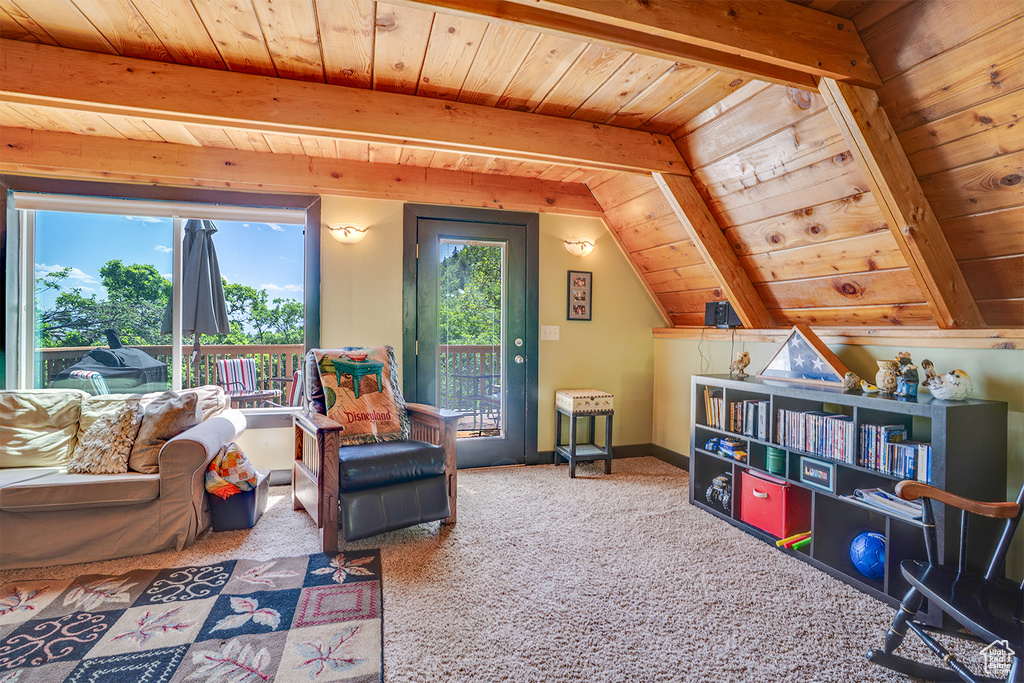 Carpeted living room featuring wood ceiling