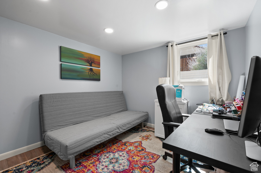 Office space featuring recessed lighting and light wood finished floors