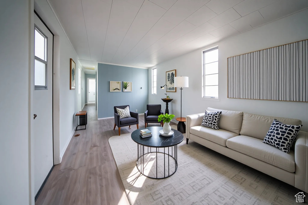 Living room featuring wood finished floors and baseboards