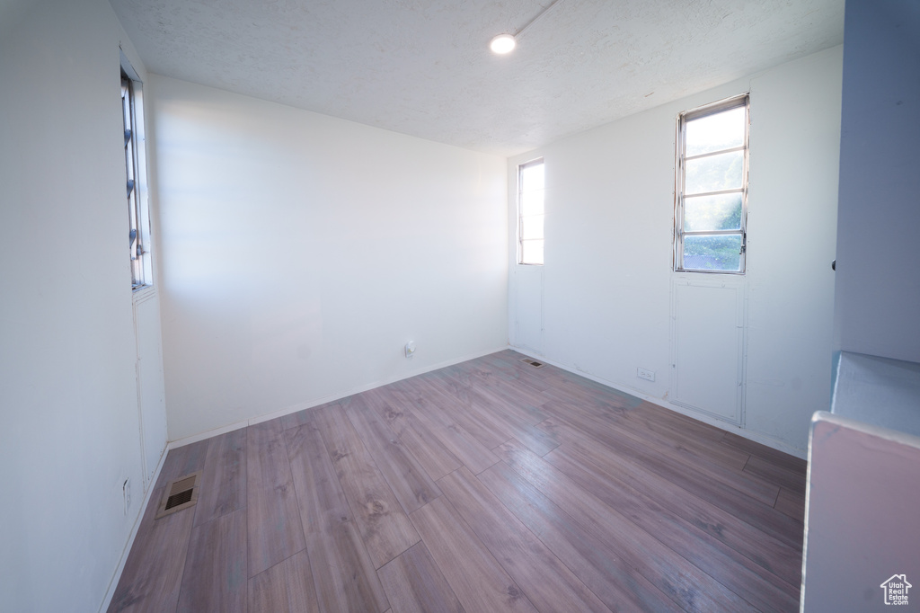Empty room with wood finished floors