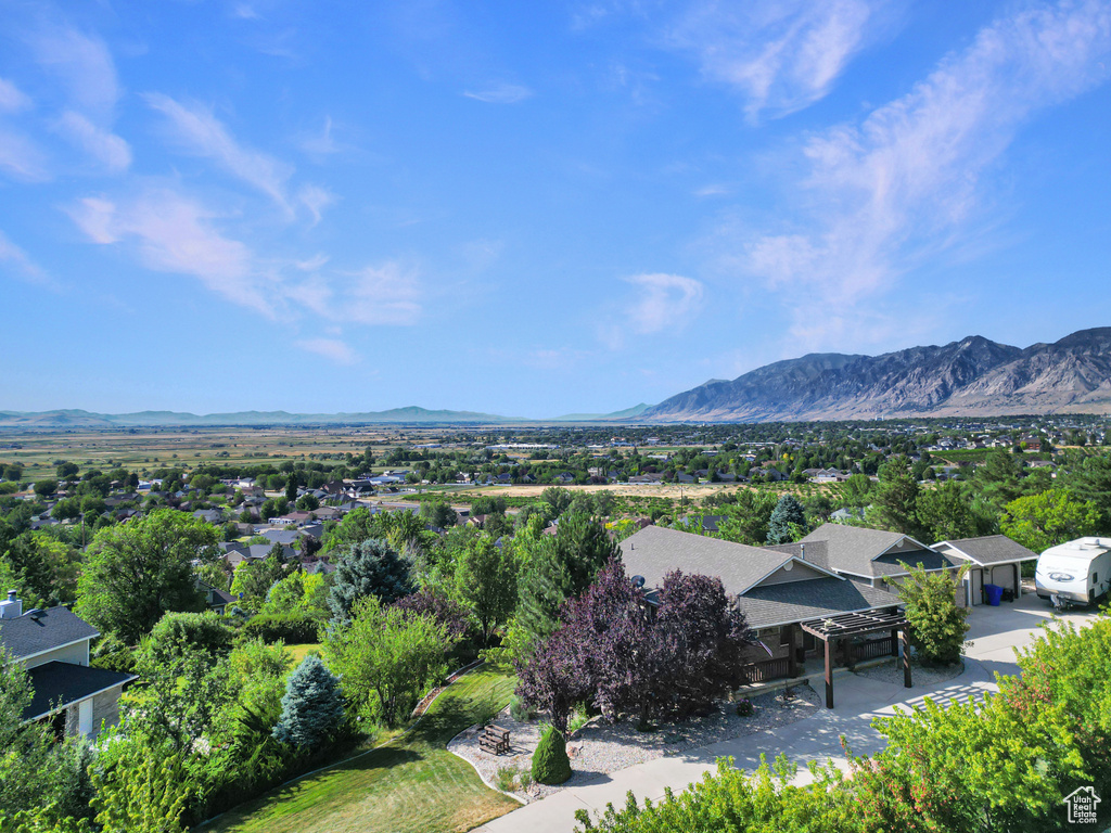Mountain view featuring nearby suburban area