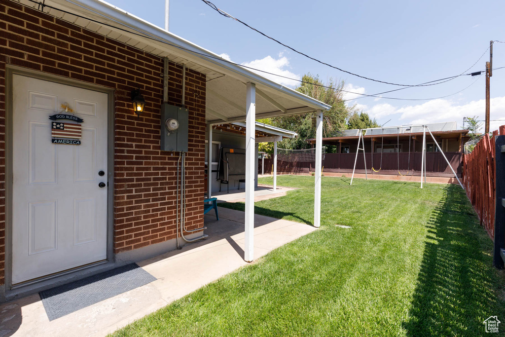 View of fenced backyard
