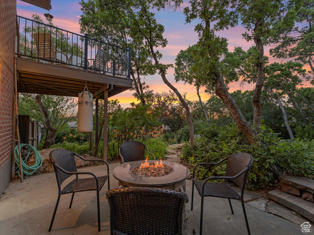 View of patio / terrace with an outdoor fire pit