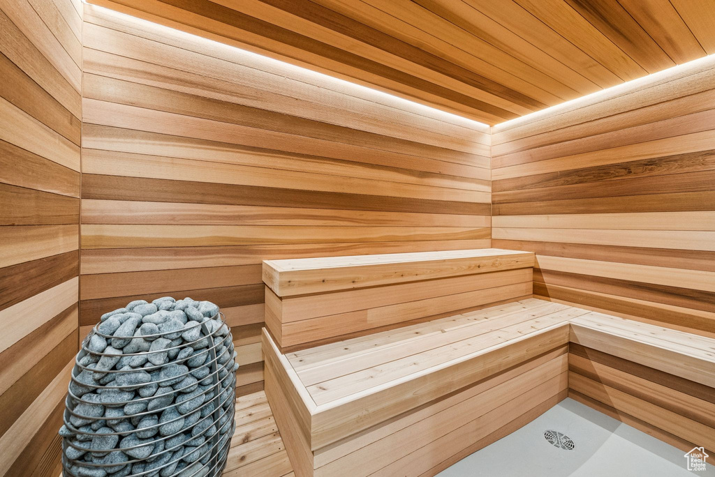 Relaxing sauna featuring wood walls