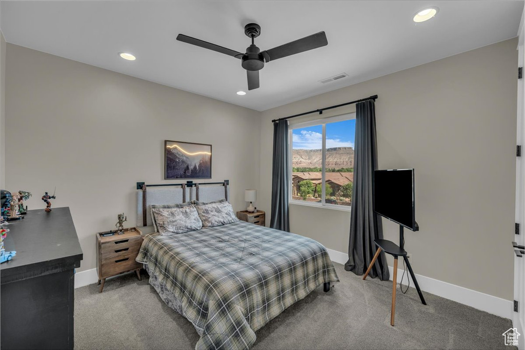 Bedroom with carpet flooring, recessed lighting, and ceiling fan