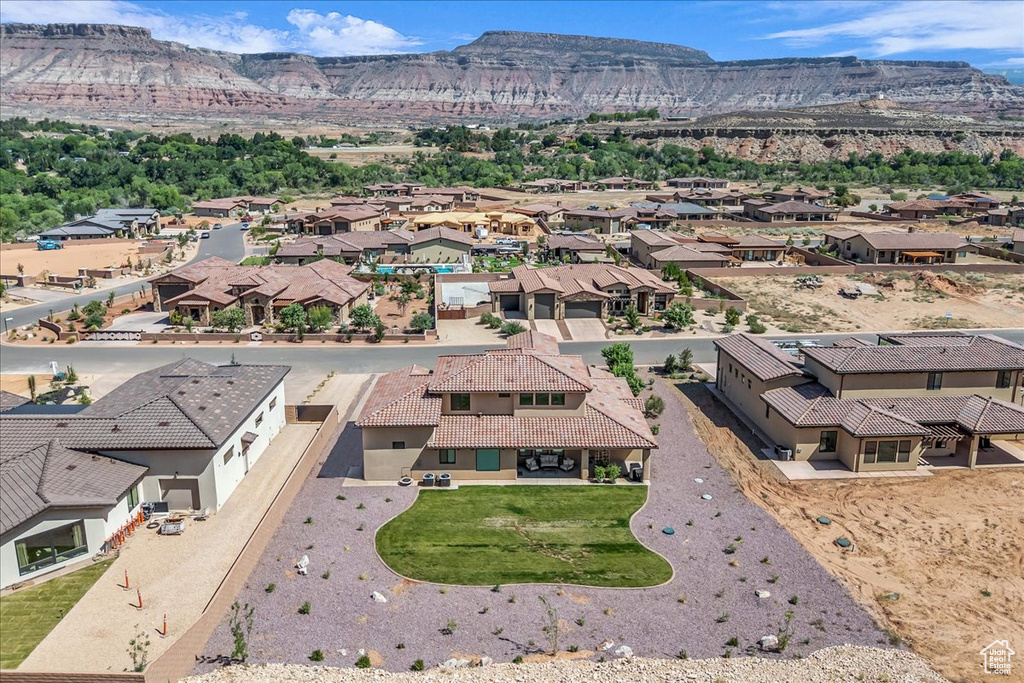 Aerial view of residential area with mountains