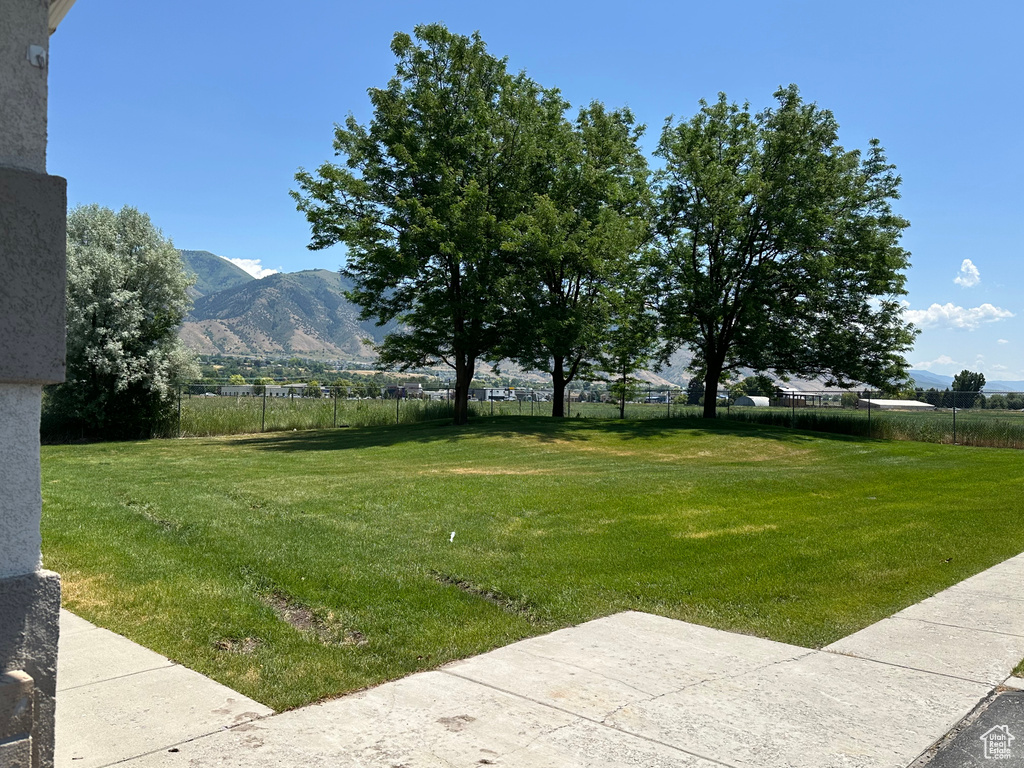 View of yard with a mountain view