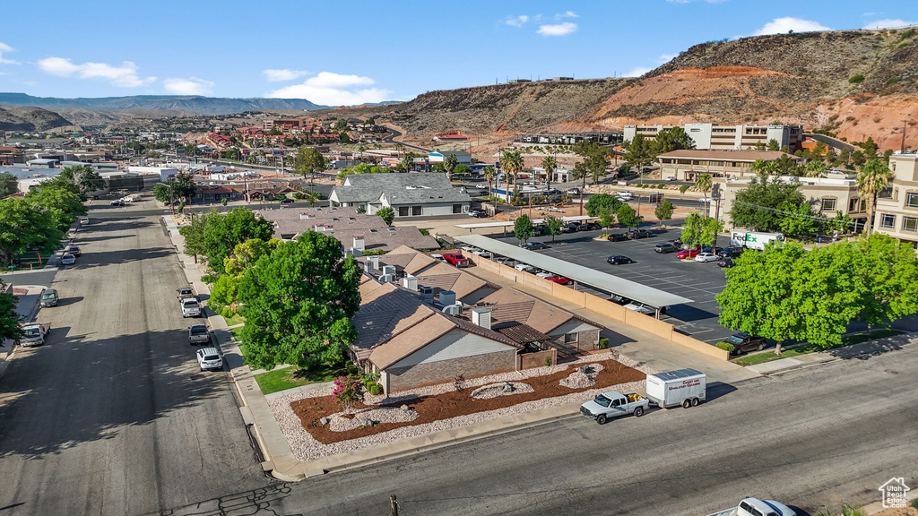 Aerial view of residential area with a mountainous background