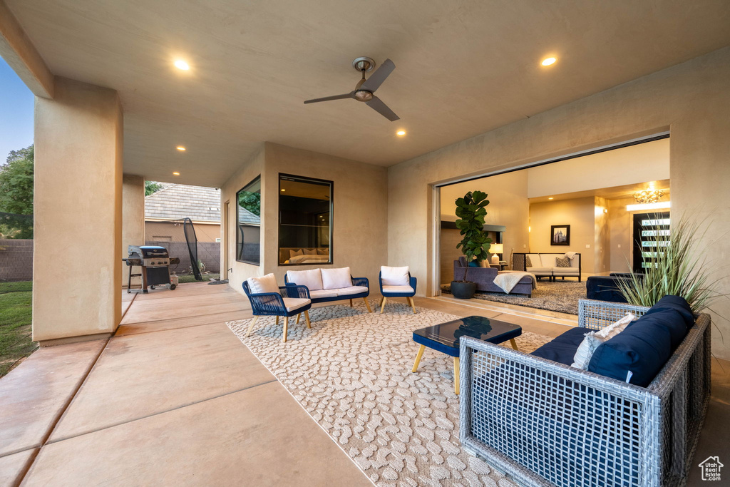 View of patio / terrace with outdoor lounge area, grilling area, and ceiling fan