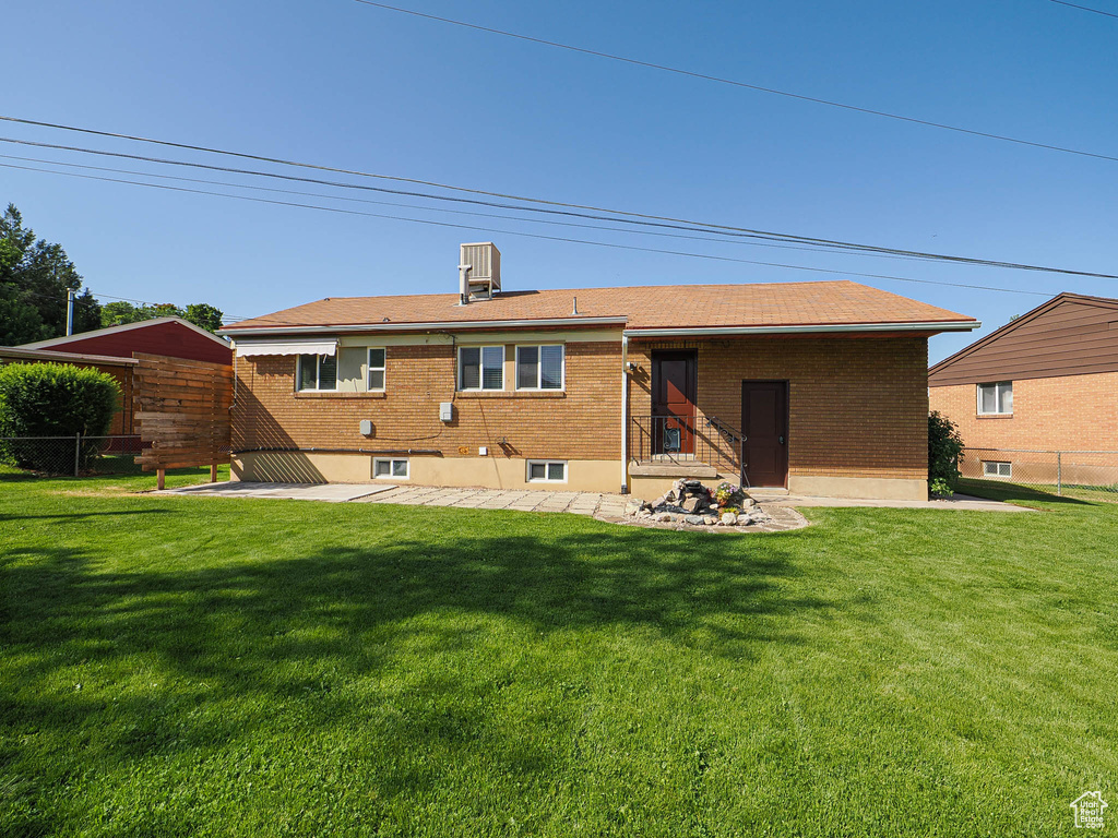 Back of property with brick siding