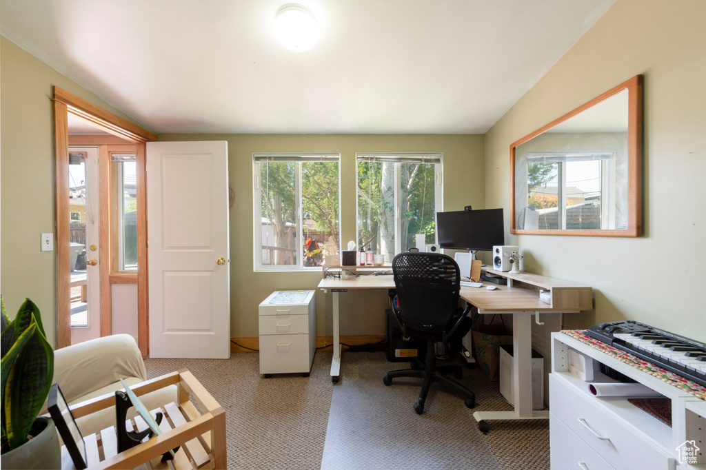 Home office with light carpet