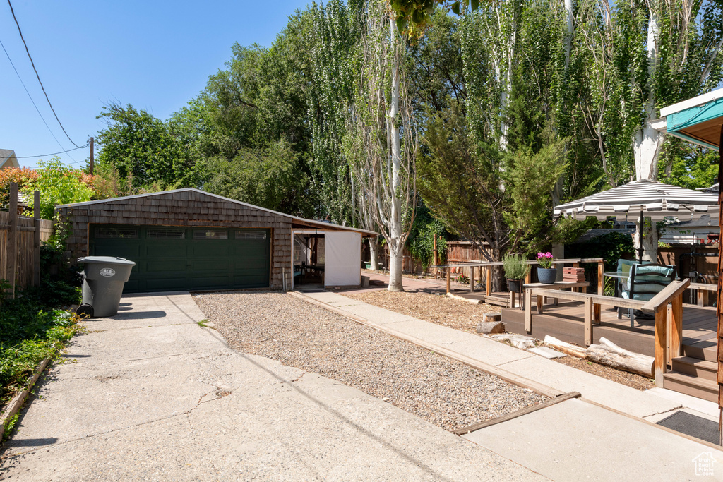 Detached garage featuring driveway
