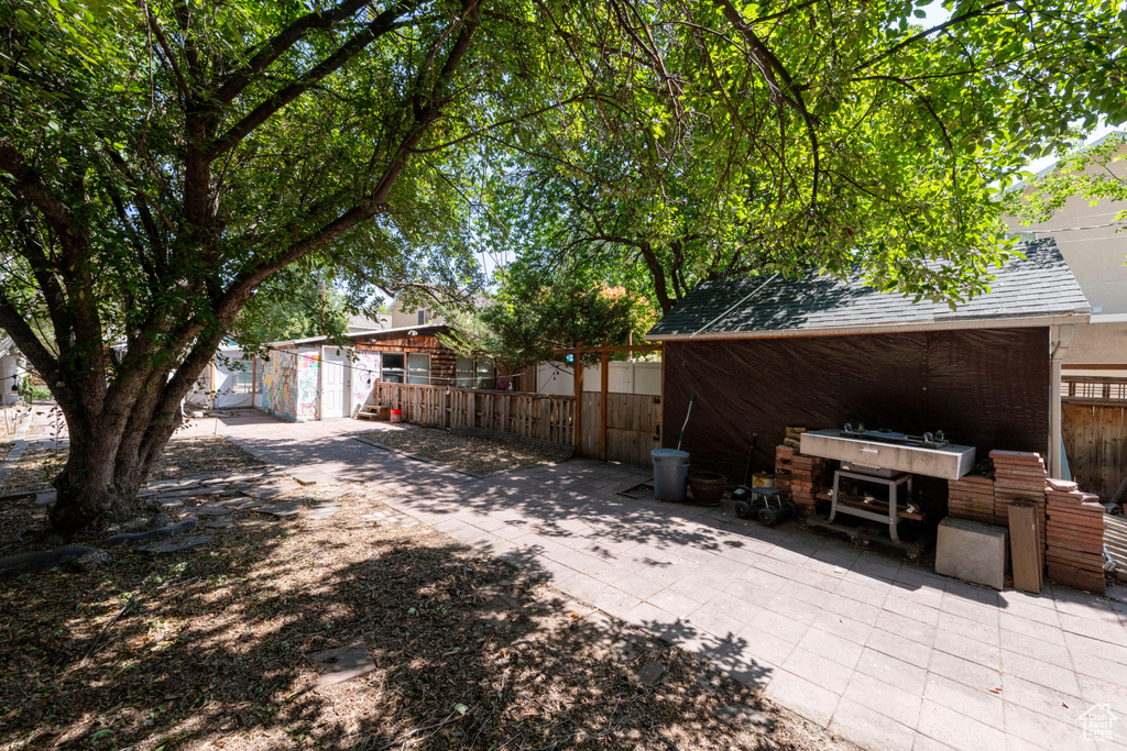 View of patio / terrace with an outbuilding