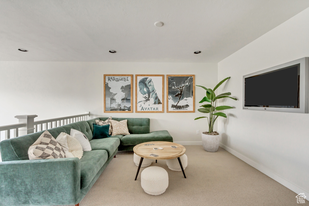 Living area featuring carpet flooring and recessed lighting