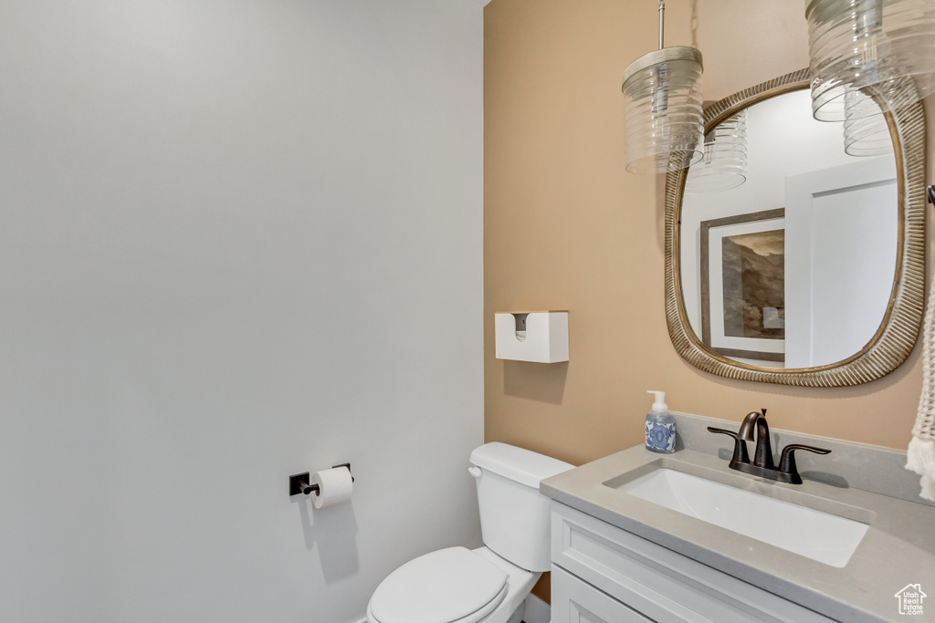 Bathroom featuring toilet and vanity
