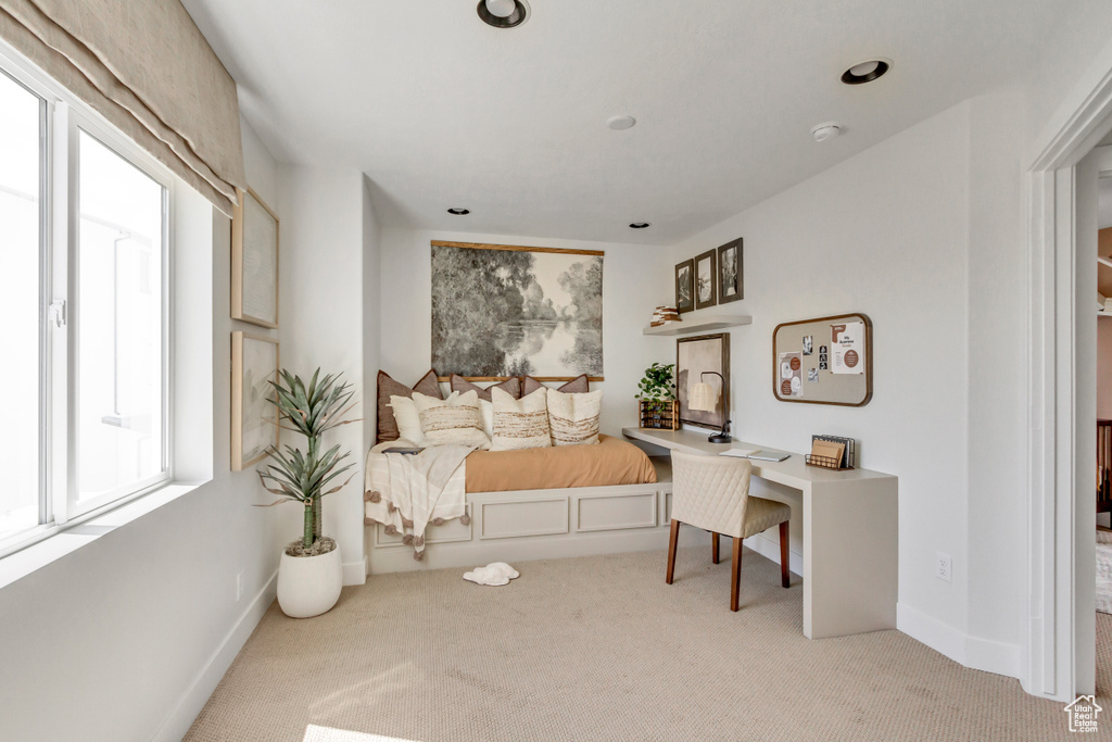 Bedroom featuring carpet floors