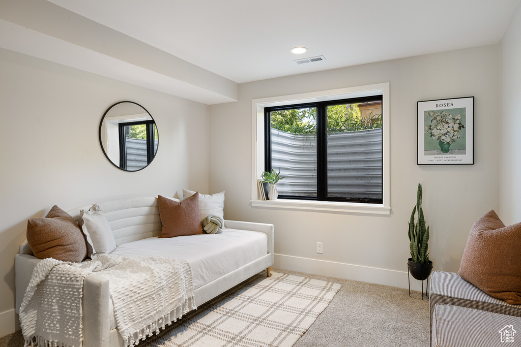 Carpeted bedroom featuring baseboards and recessed lighting