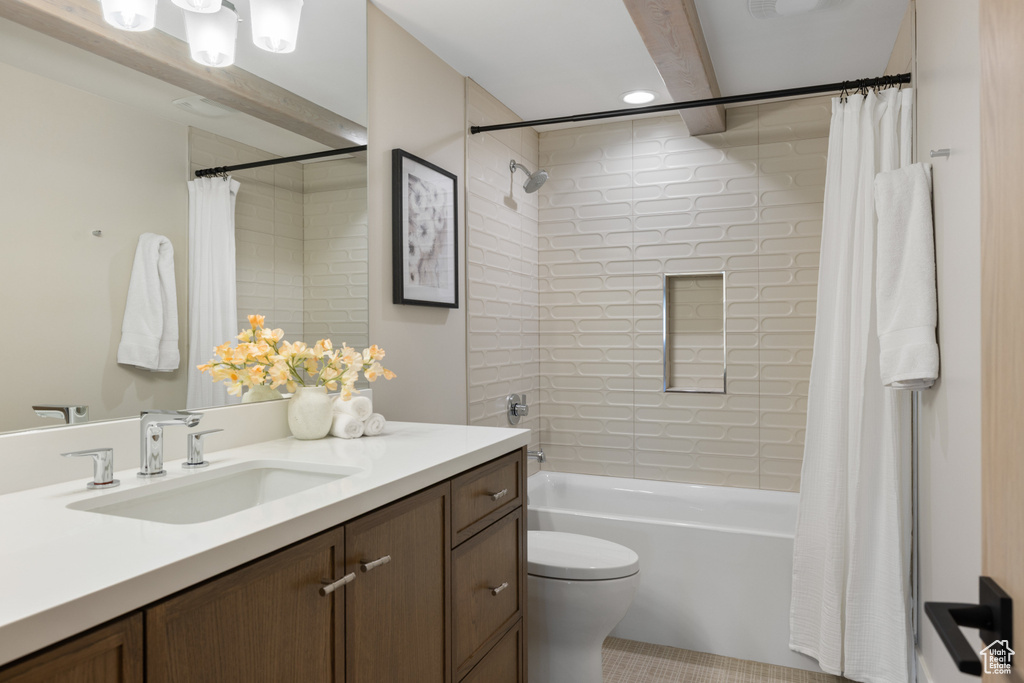 Full bath featuring vanity, shower / tub combo, and recessed lighting