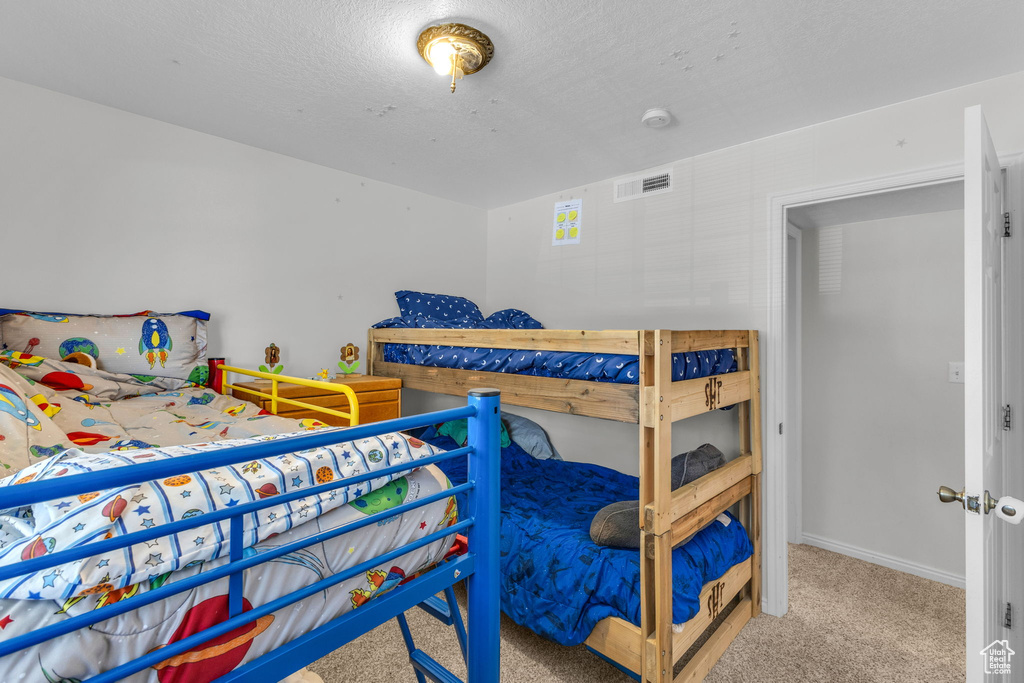 Bedroom featuring carpet floors