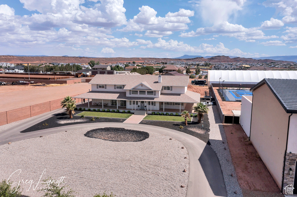 Aerial view of residential area with mountains