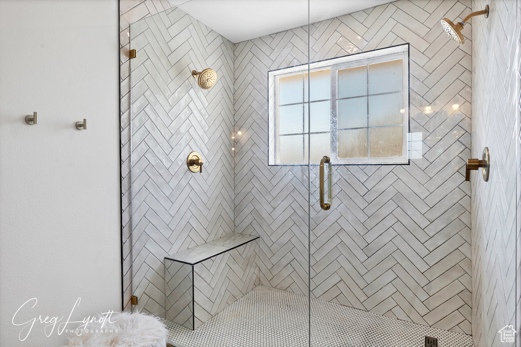 Full bathroom with a tile shower