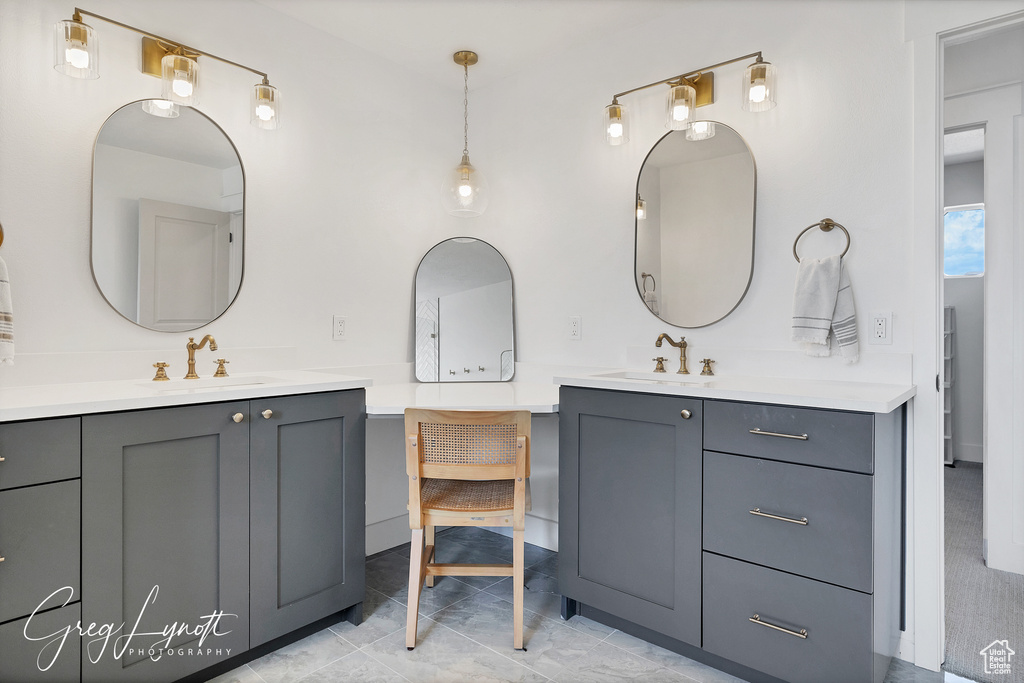 Bathroom featuring two vanities