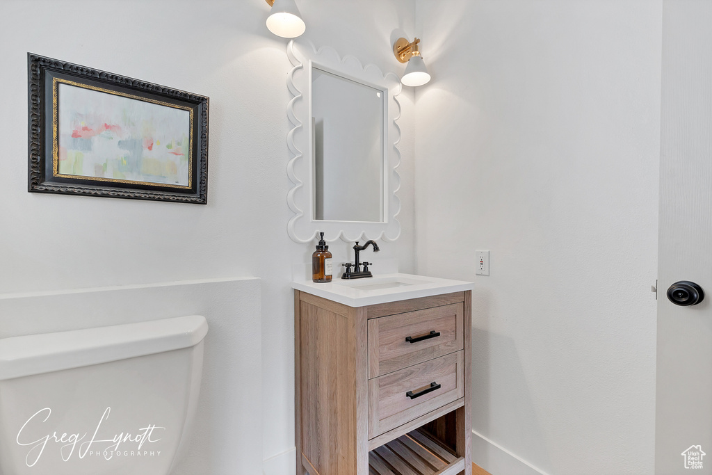 Bathroom featuring toilet and vanity