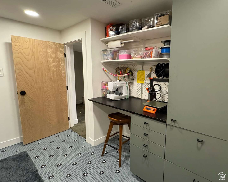 Office area with baseboards